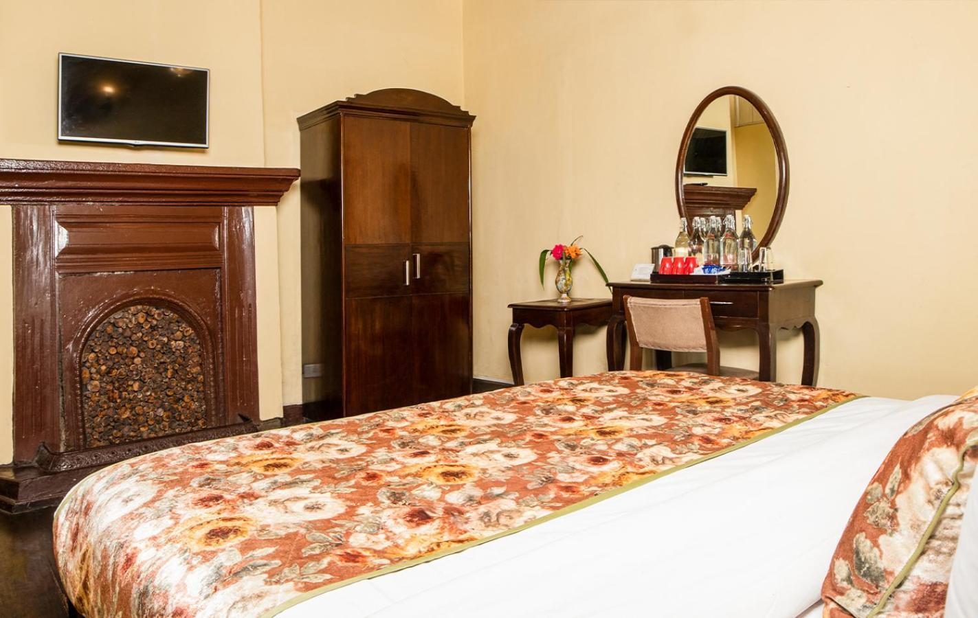 Summit Swiss Heritage Resort & Spa Дарджилінг Номер фото